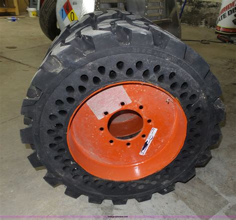 power wheels skid steer|bobcat skid steer solid tires.